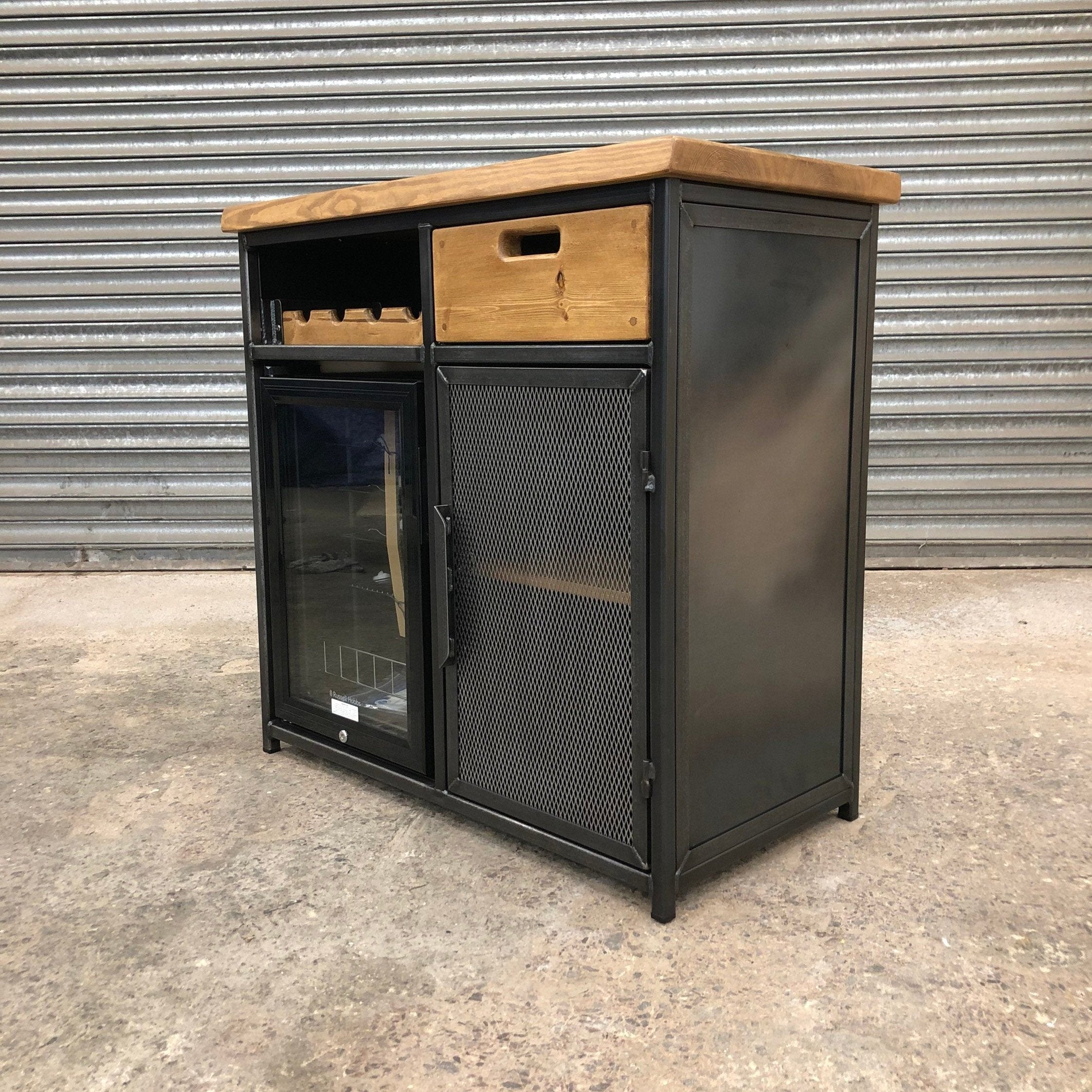 Industrial-style wine cabinet with rustic wood counter and storage
