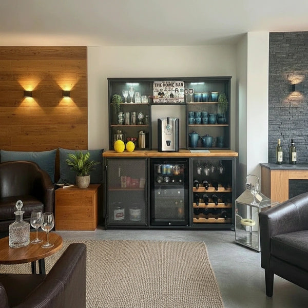 Modern home bar with cabinets, appliances, and decor in a living room setting.