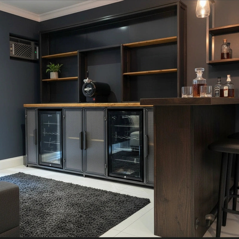 Modern bar setup with dark cabinets, a refrigerator, and wooden shelves.