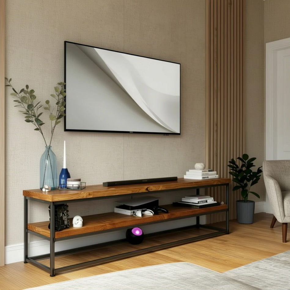 Wooden TV stand with electronic devices in a living room setting.
